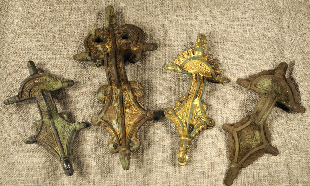 These beautiful buckles were found at the excavation site at Sandby Borg. The exclusive accessories, representative of the skillful craftsmanship of the time (the sixth century), were used by the upper class and measures between 12 and 16,5 cm. photo: Max Jahrehorn, Kalmar Country Museum