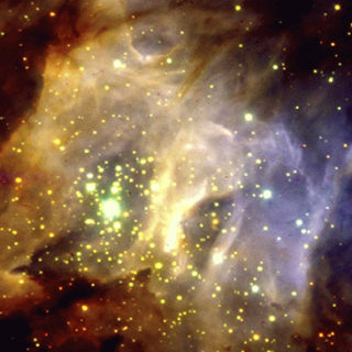 This image displays a region in the Milky Way at a distance of about 5,000 light years, where stars which have recently formed in clouds of gas and dust are still heavily obscured. The diffuse radiation is a mixture of starlight scattered by the dust and gas in the area, and atomic and molecular hydrogen line emission. Photo: ESO